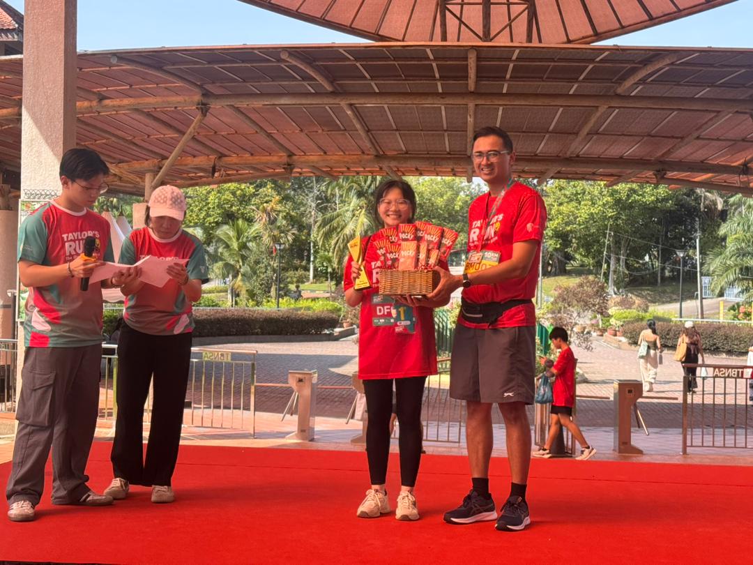 Taylor’s Residence resident receiving recognition for her podium finish at Taylor’s Run 2026.