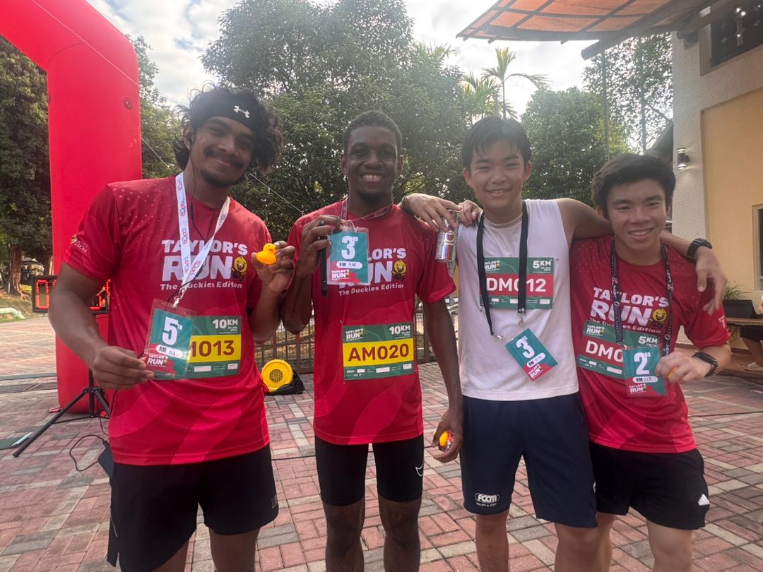 Taylor’s Residence residents celebrating their achievements with medals after completing Taylor’s Run.