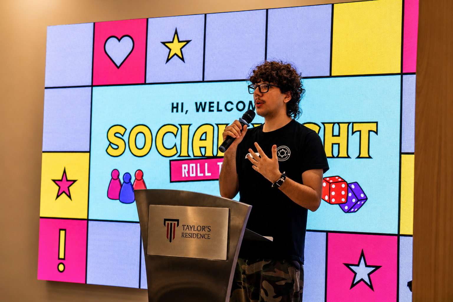 Boards & Brews representative welcoming residents to the SRC Social Board Game Night.