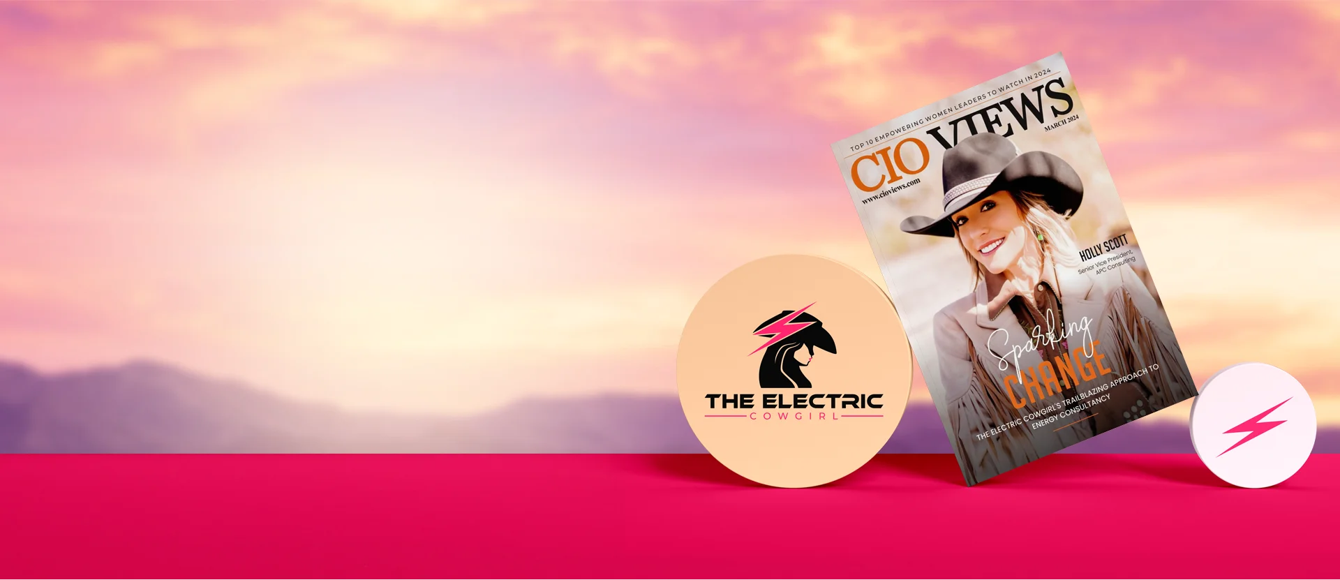 Magazine cover of CIO Views featuring Holly Scott with the title 'Sparkling Change' alongside The Electric Cowgirl logo showing a cowgirl silhouette with a pink lightning bolt.