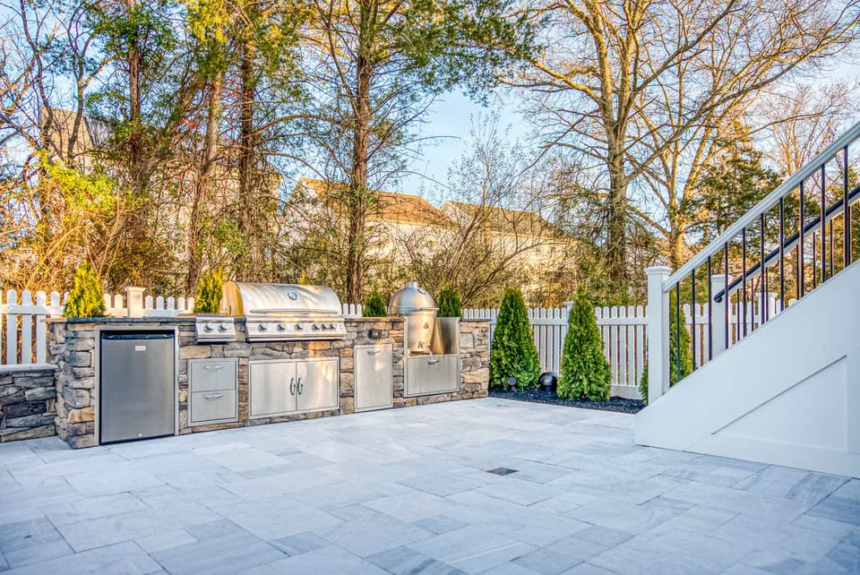 Luxury outdoor kitchen on patio in Northern VA with stainless steel appliances