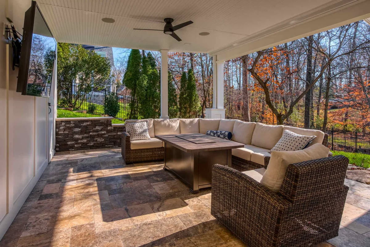 floating-tv-and-outdoor-couch-furniture-with-white-under-deck-drain-system-in-northern-virginia
