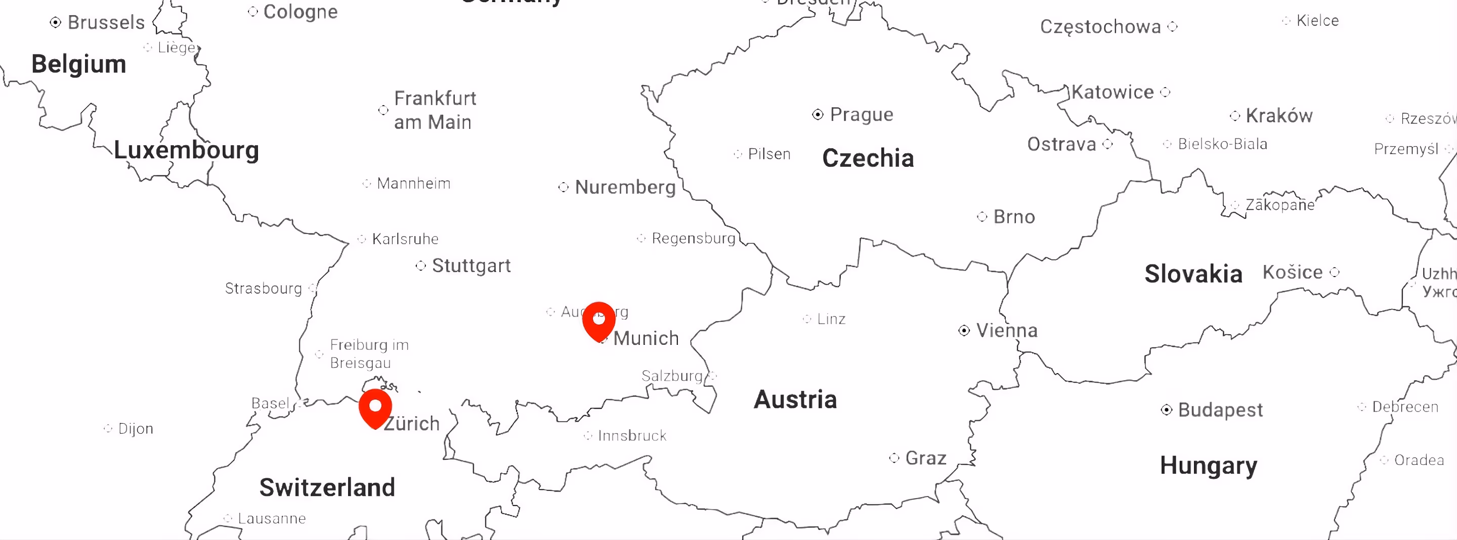 Map of central Europe focusing on Switzerland, Germany, Austria, Czechia, Slovakia, and Hungary with red location markers on Zurich and Munich.