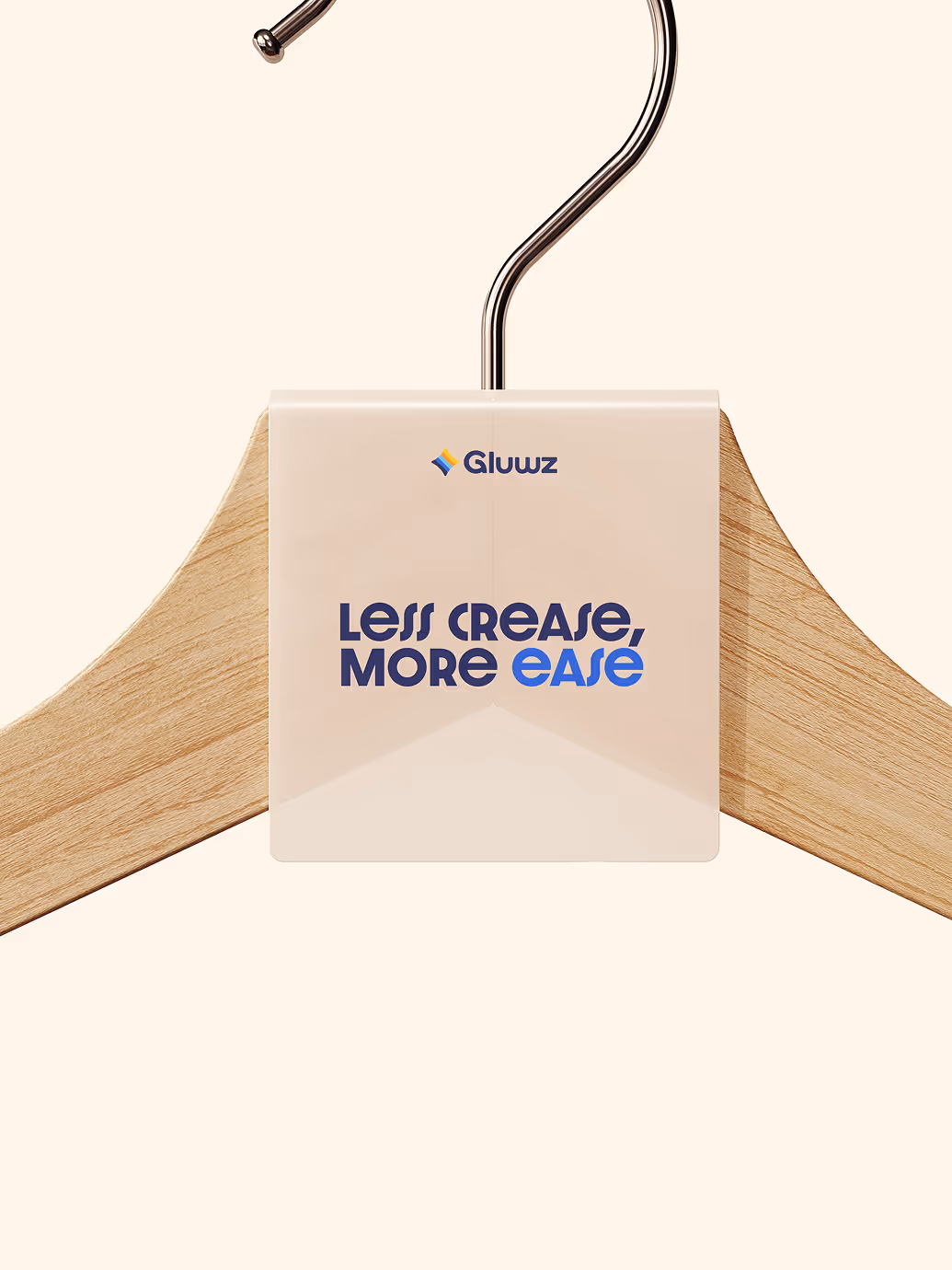 Wooden clothes hanger with a beige label reading 'Gluuz Less crease, more ease.'