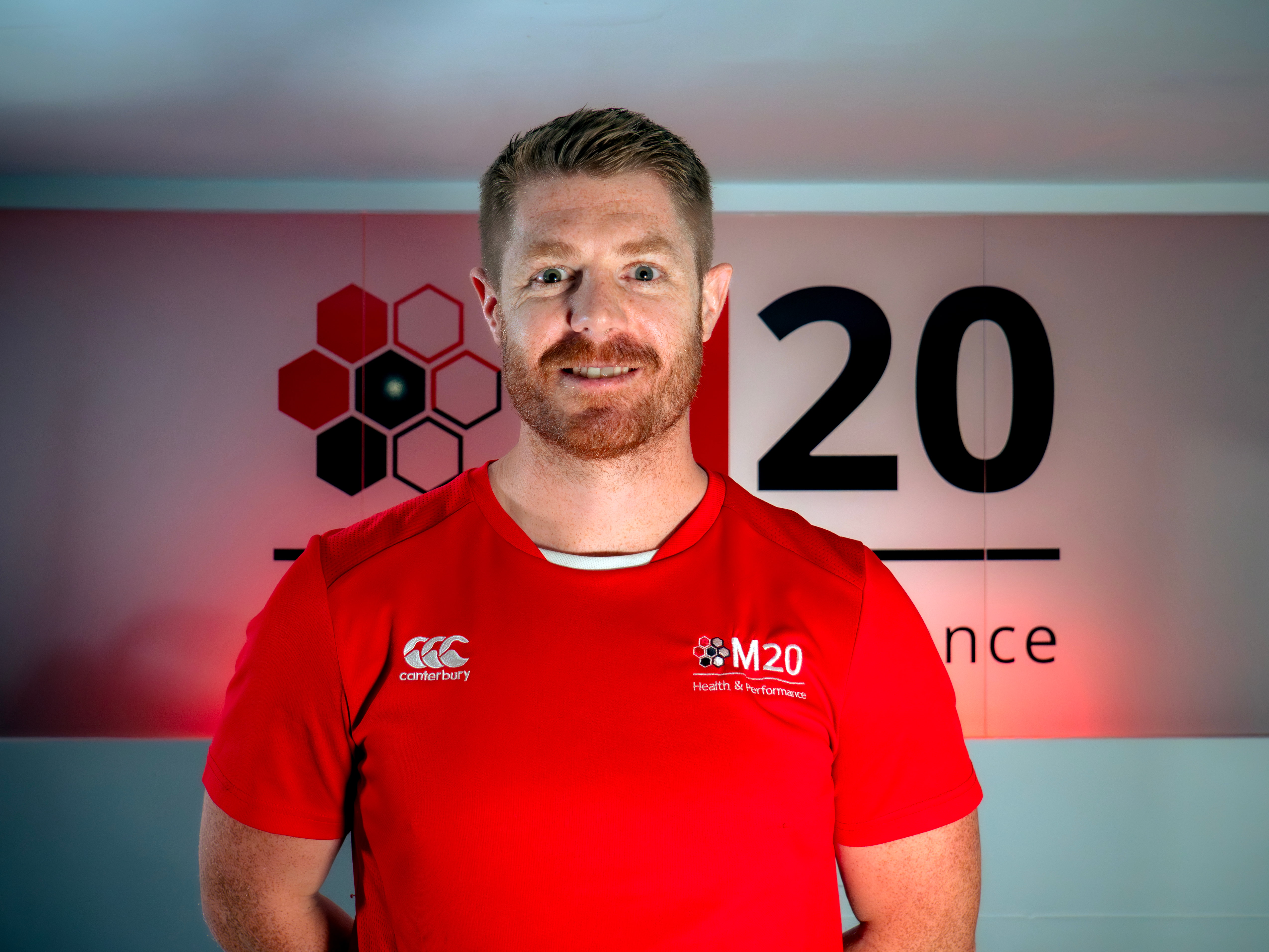 A portrait image of Ryan Gordon, clinic director, injury and strenght and conditioning lead for M20 Health & Performance