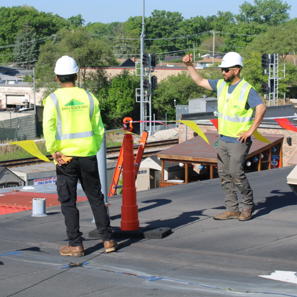 Comparison of TPO EPDM and PVC flat roofing systems on a commercial roof