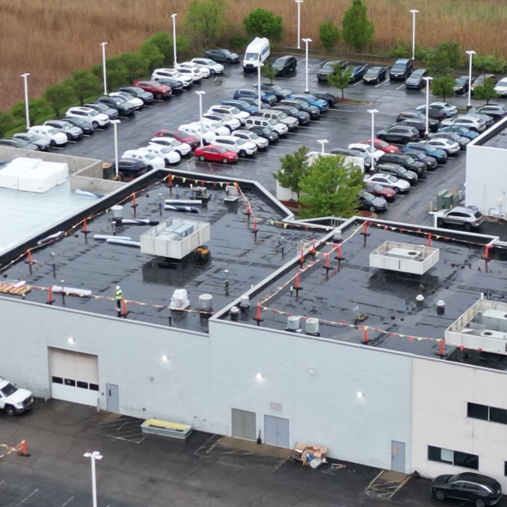 Comparison of TPO EPDM and PVC flat roofing systems on a commercial roof
