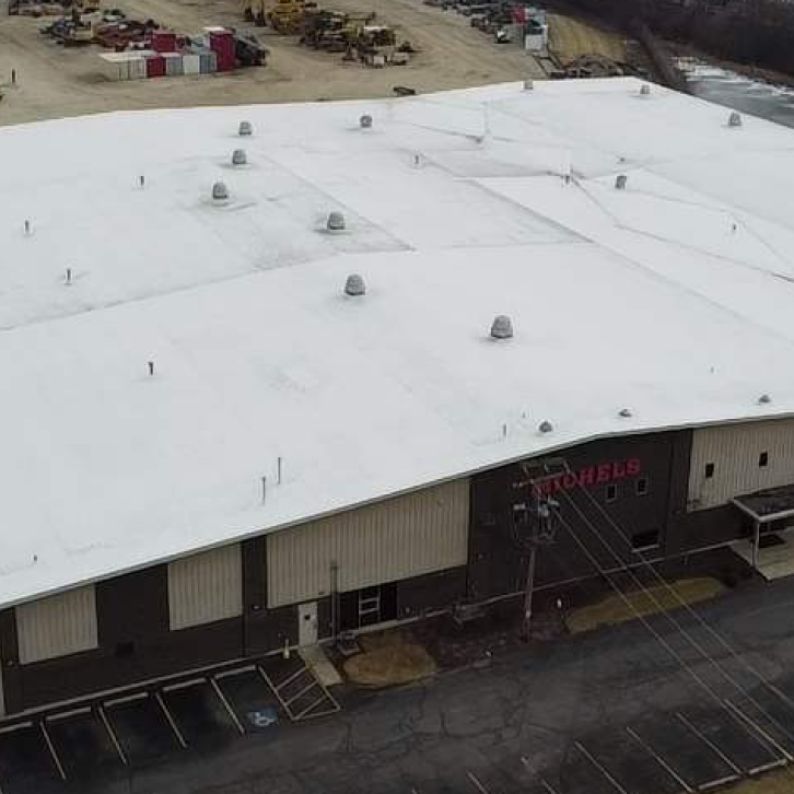 Comparison of TPO EPDM and PVC flat roofing systems on a commercial roof