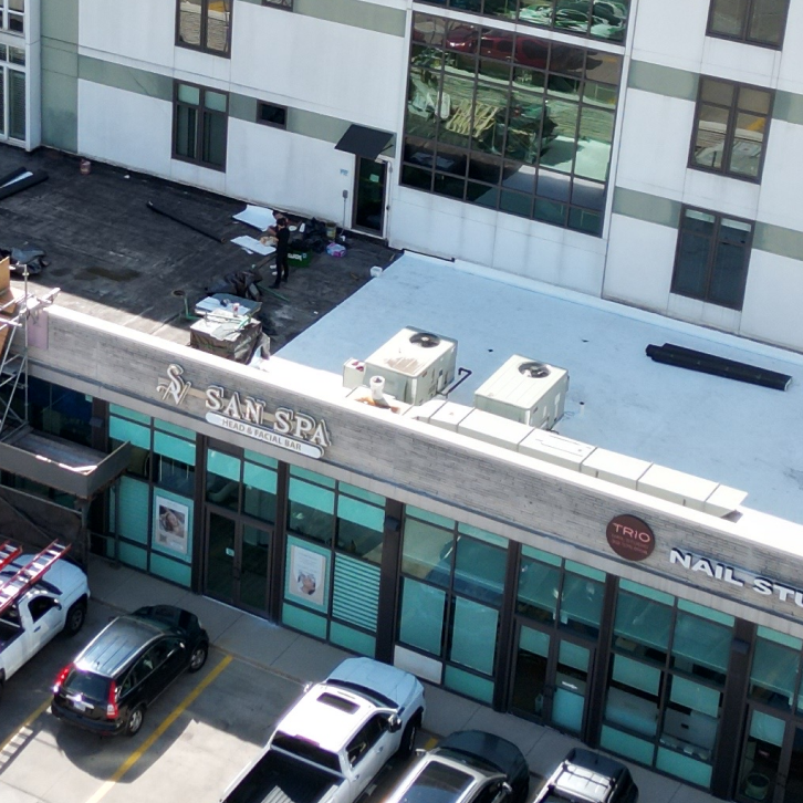Comparison of TPO EPDM and PVC flat roofing systems on a commercial roof