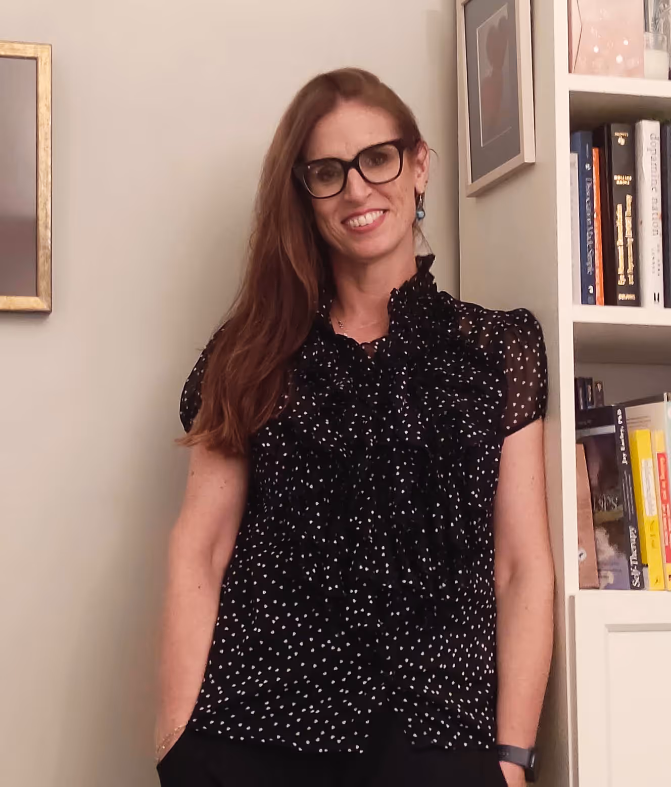 Deirdre standing up in her therapy room