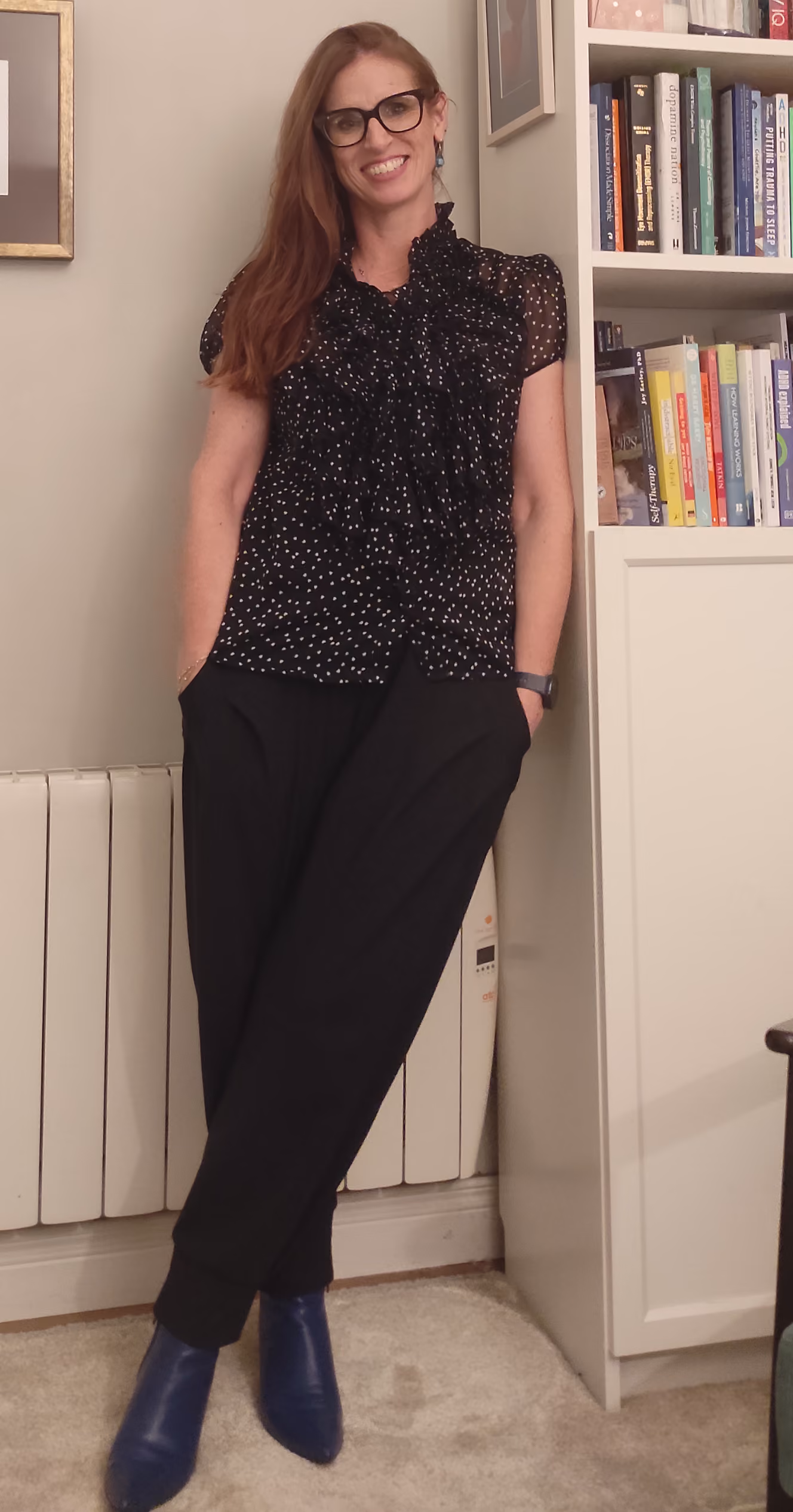 Deirdre standing up in her therapy room