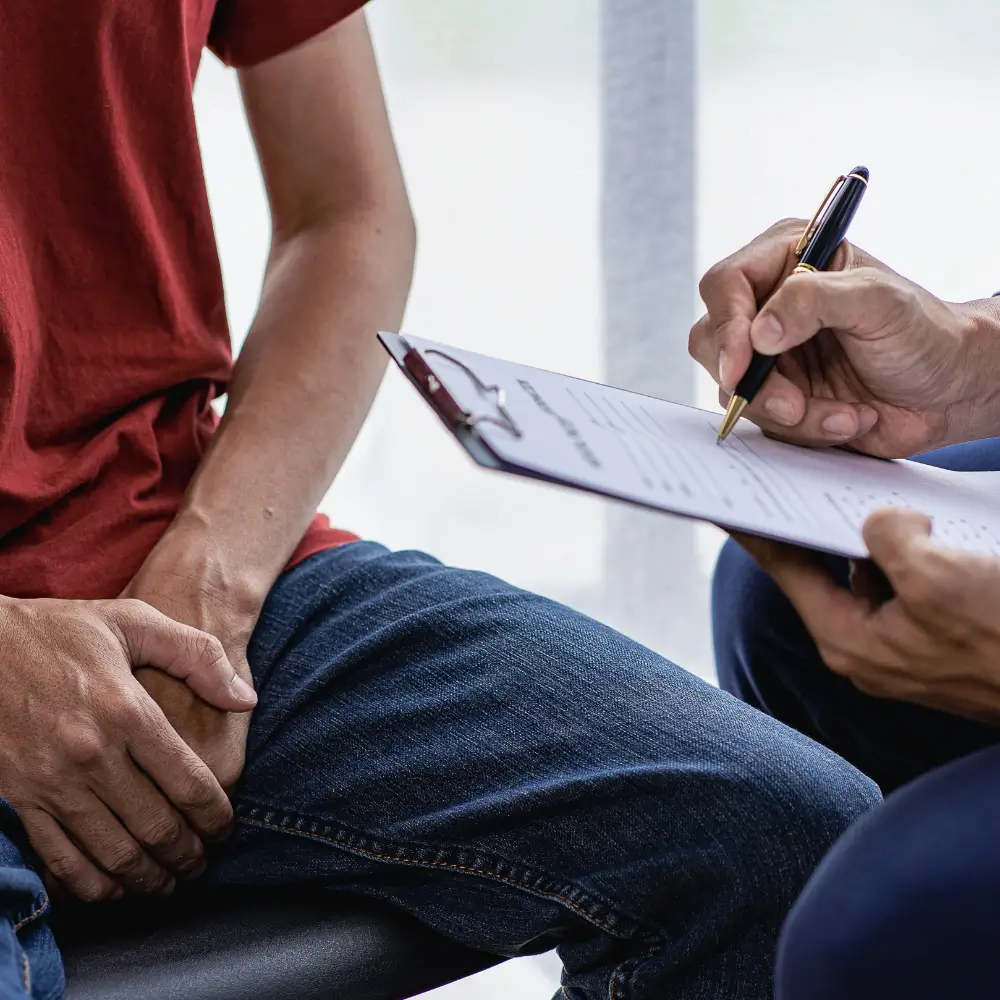 Mental health professional conducting an intake assessment with a client
