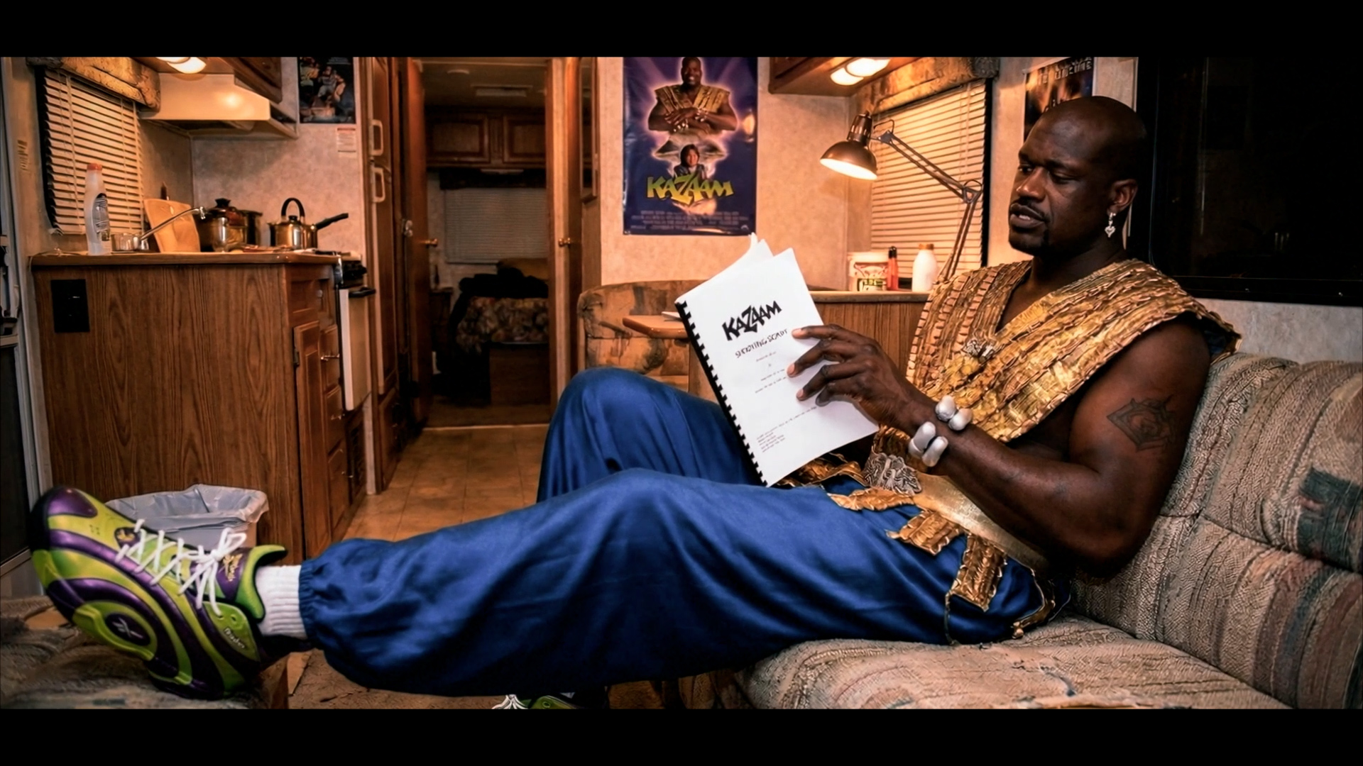 Present-day Shaq reading the script in his trailer