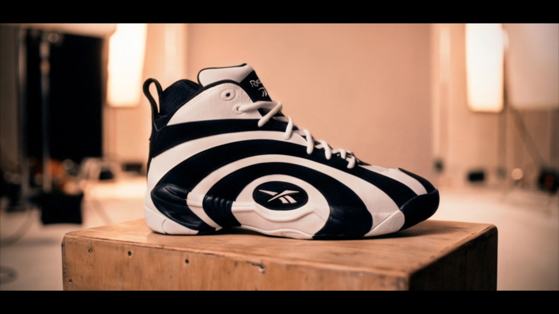 The Reebok Shaqnosis sneaker, studio-lit product hero