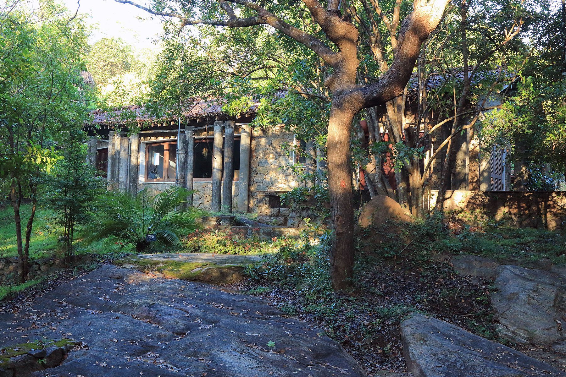 A building structure front view of the Popham's Arboretum garden trail