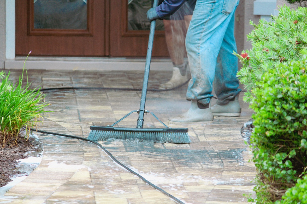 Professional paver cleaning on a Palm Coast Florida driveway