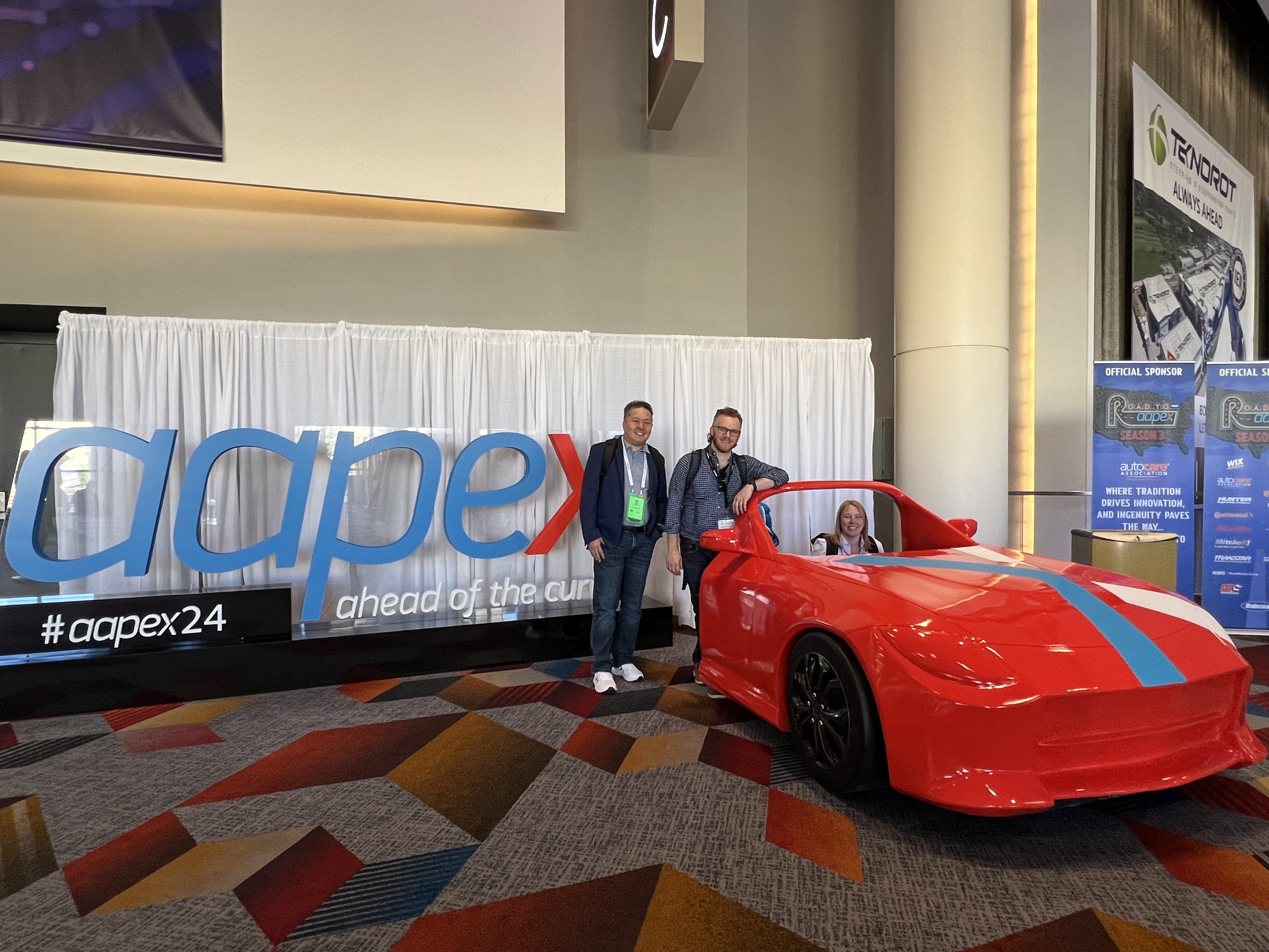 Tromml team members at automotive industry conference