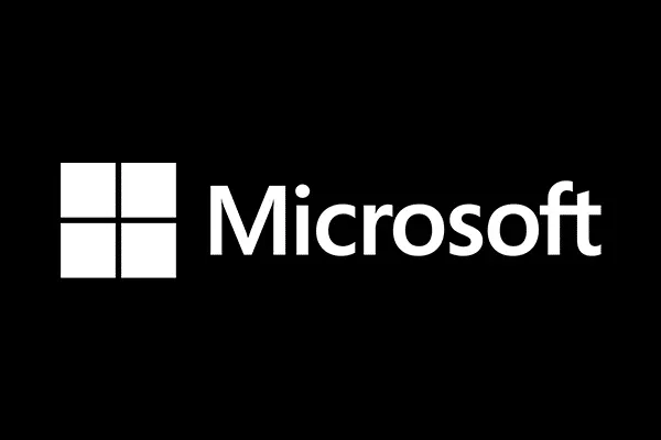 Microsoft logo with four white squares and the word Microsoft in white on black background.