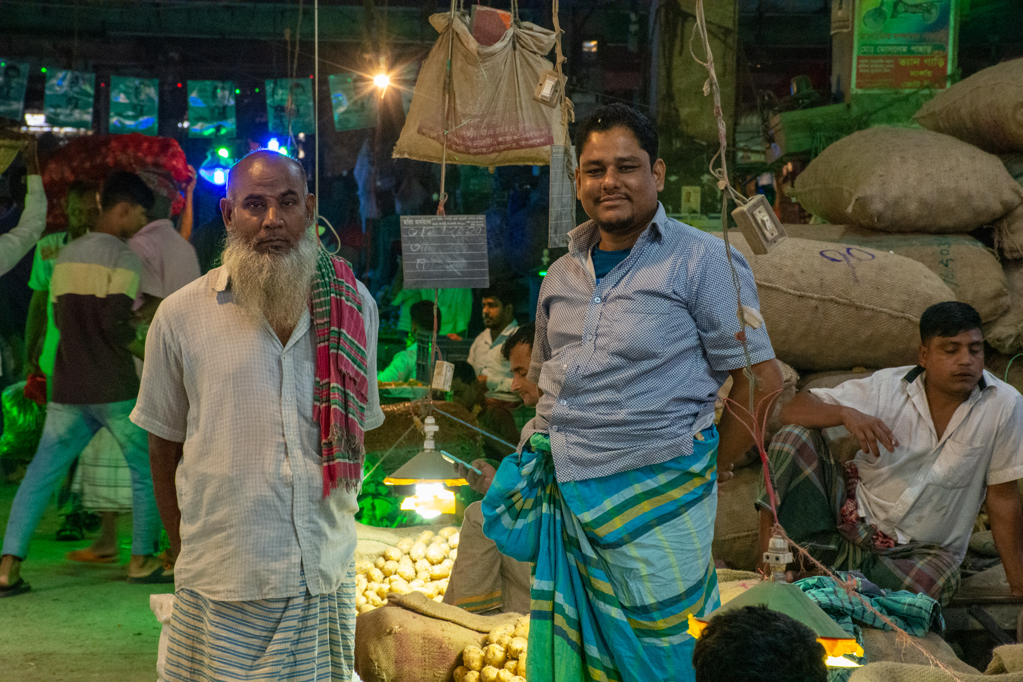 Merchants at the kawran bazar market in dhaka, bangladesh.