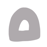 A shaded organic shape resembling an archway with thick borders and a open portal in the centre.