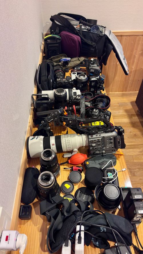 Large amount of professional photography and videography equipment.