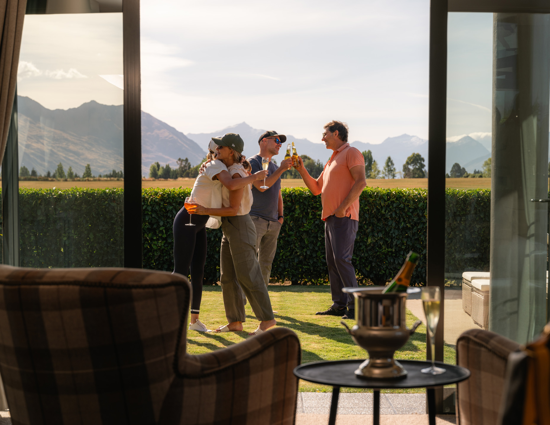 Commercial photography of people looking out a window. 