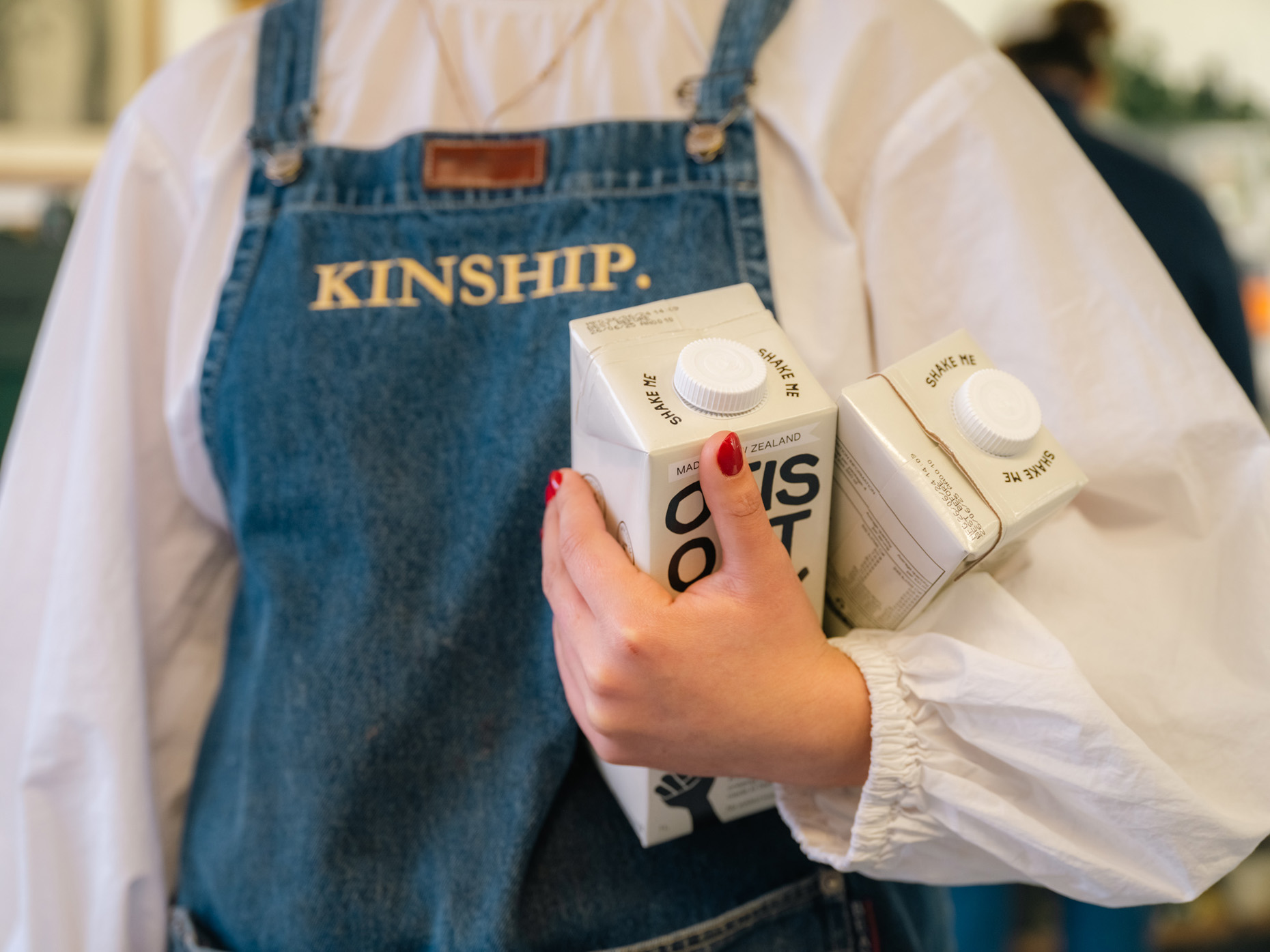 Commercial photography, barista with oat milk