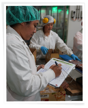 QA team checking final weights of Big Dog Pet Foods products