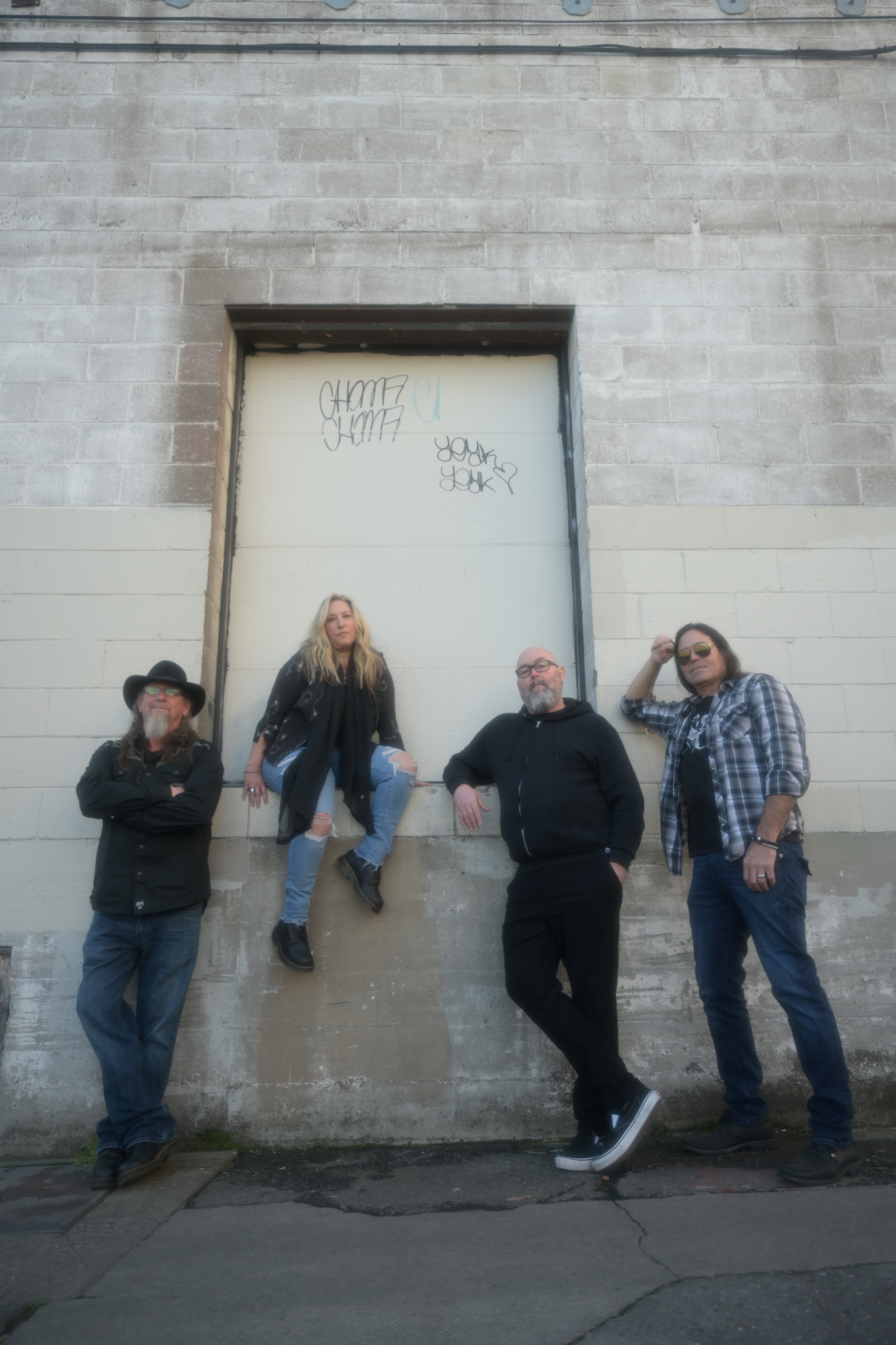 band in alley, black doorway