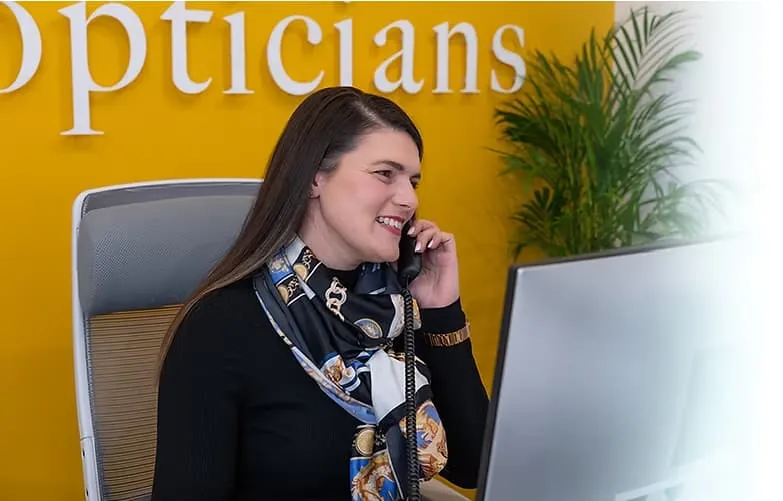 E&G Opticians receptionist answering phone