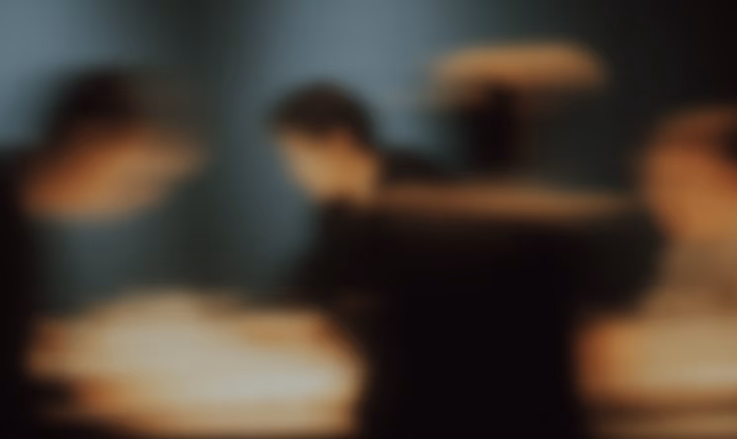 Blurry image with dark and light areas, details indistinguishable.