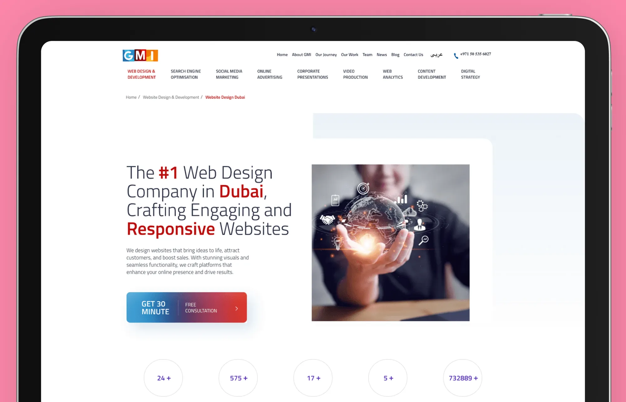 Global Media Insight web design agency website displayed on a tablet screen. The hero section features bold text stating '#1 Web Design Company in Dubai,' emphasizing expertise in crafting engaging and responsive websites. A call-to-action button offers a free 30-minute consultation. To the right, an image of a person holding a holographic globe represents innovation and digital transformation. The website layout is clean and professional, with a navigation menu showcasing services such as SEO, social media marketing, and content development.