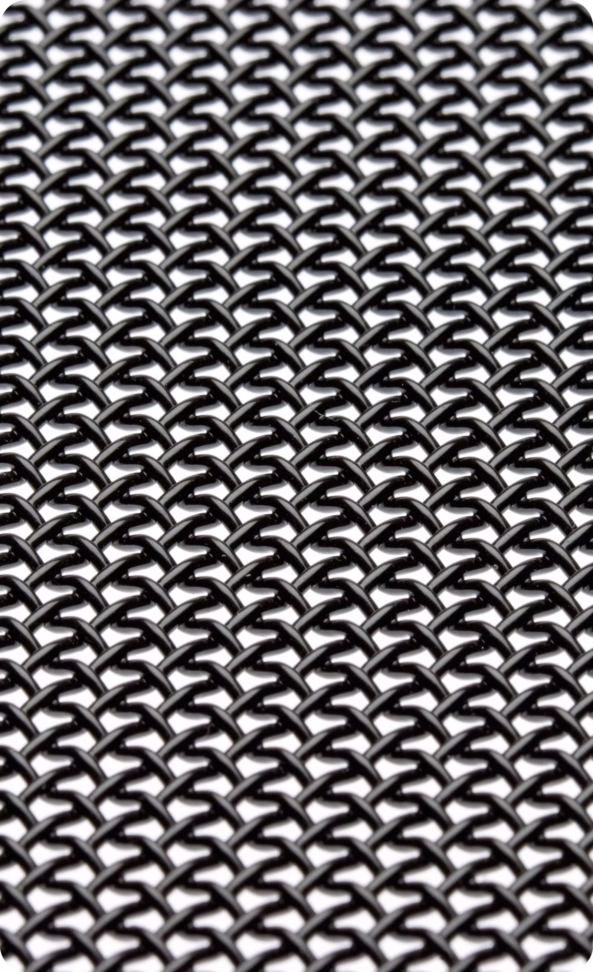 Close-up of a black metal mesh grid pattern with interconnected links.