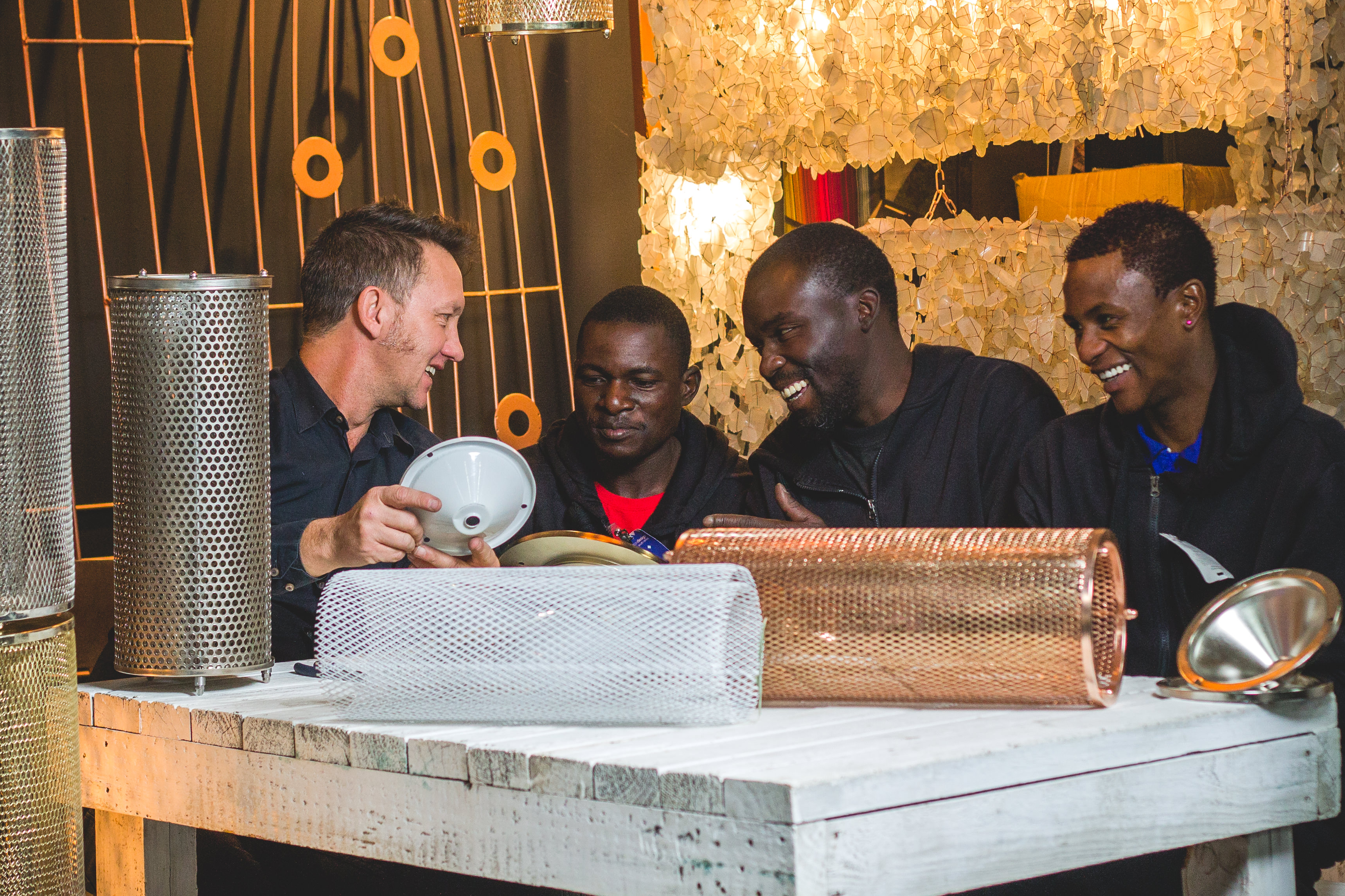 Stephen at his workshop creating lights with the team