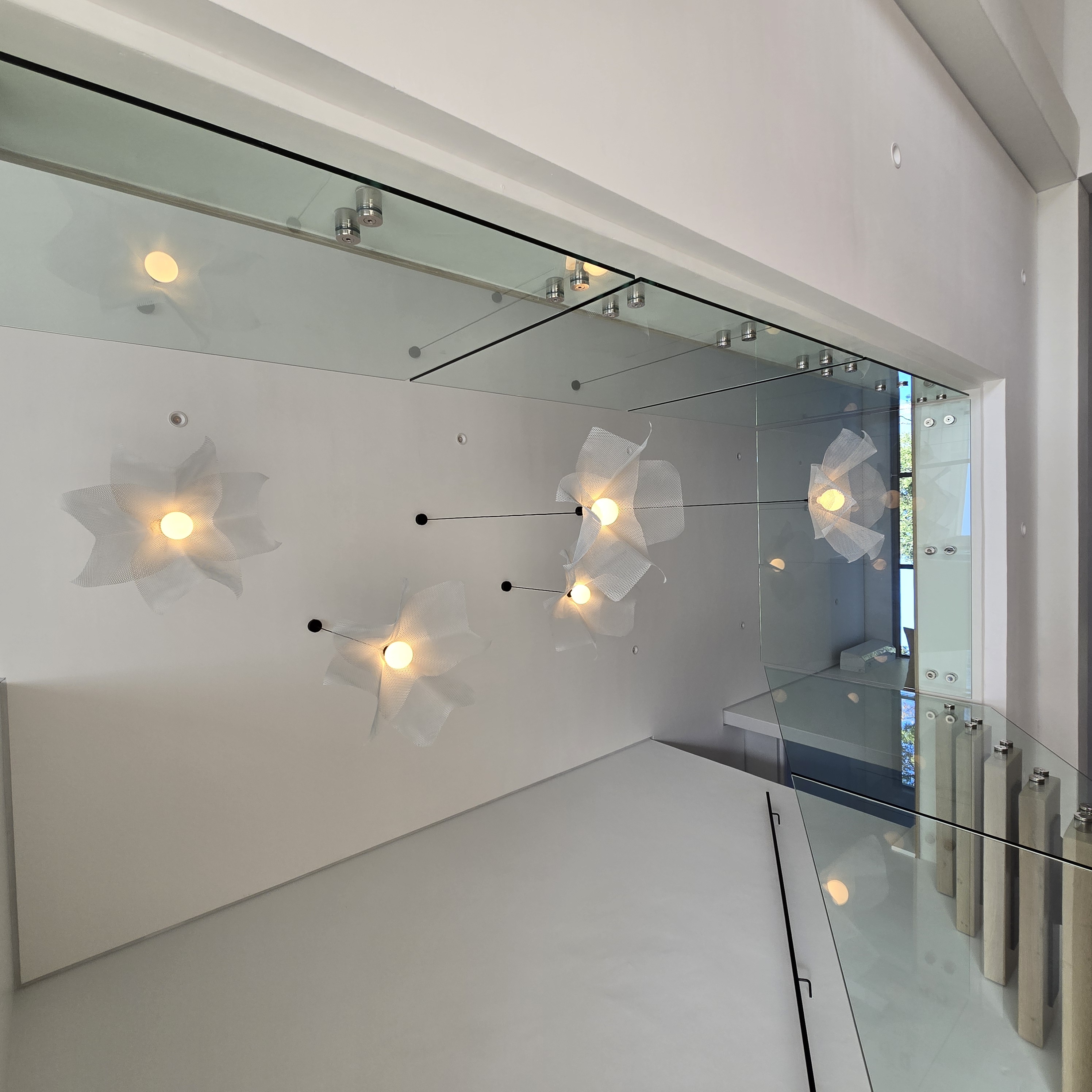 Single Layered Blooms in Silver in a Double Volume Space  for a client in Val de Vie Estate