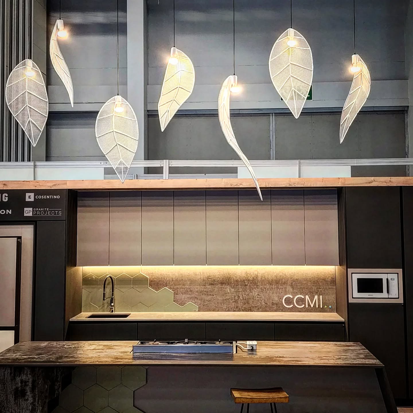 Silver and Gold Leaf lights over a kitchen island