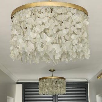 Two glass crystal chandeliers made from recycled and repurposed materials