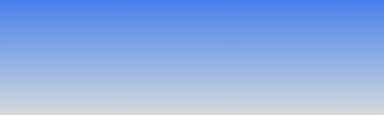 Gradient sky background transitioning from blue at the top to light gray at the bottom.