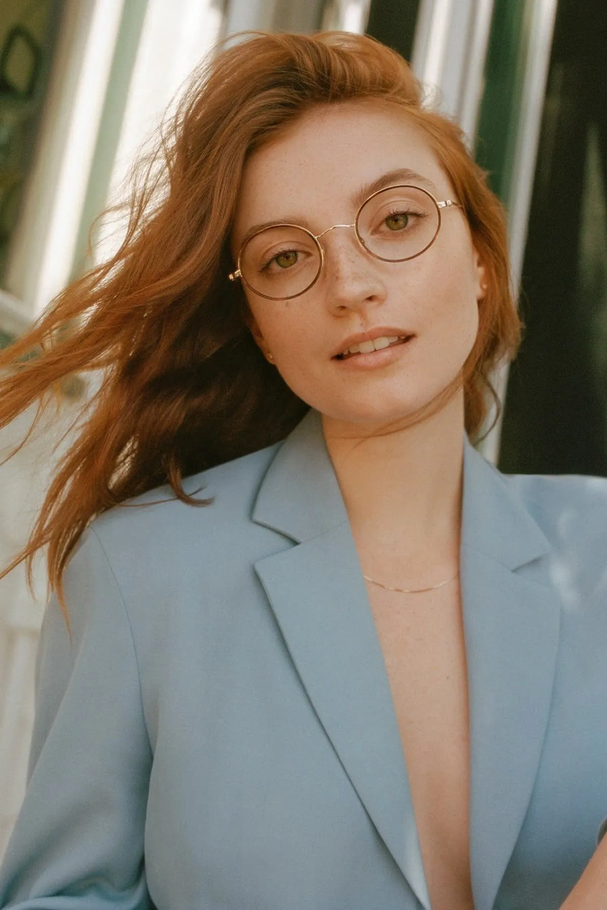 Woman wearing stylish designer glasses