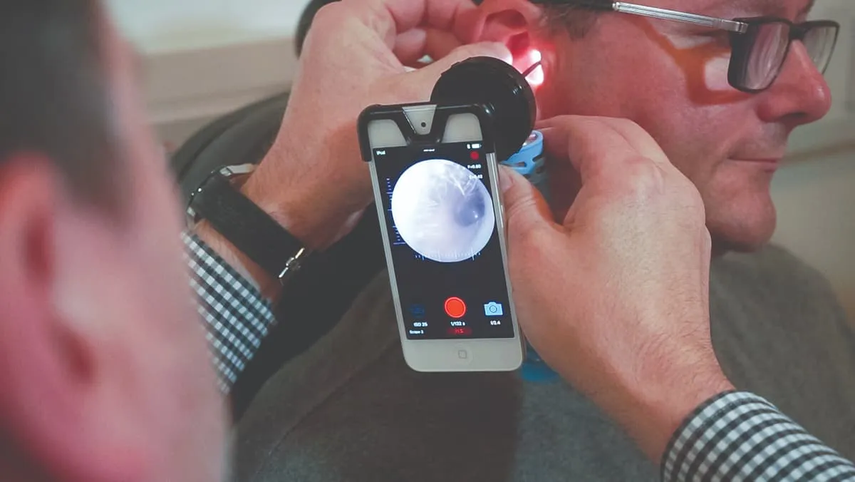 Woman having hearing test