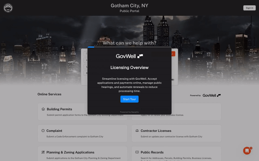 GovWell dashboard showing Building Permits section with map markers and a table listing permit records submitted by Bruce Wayne.