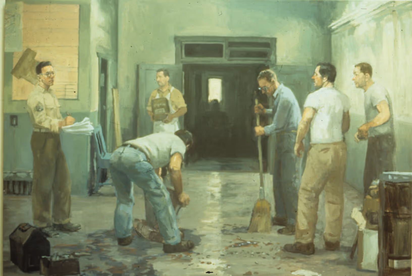 Six men in a room working on floor renovations using tools and materials.