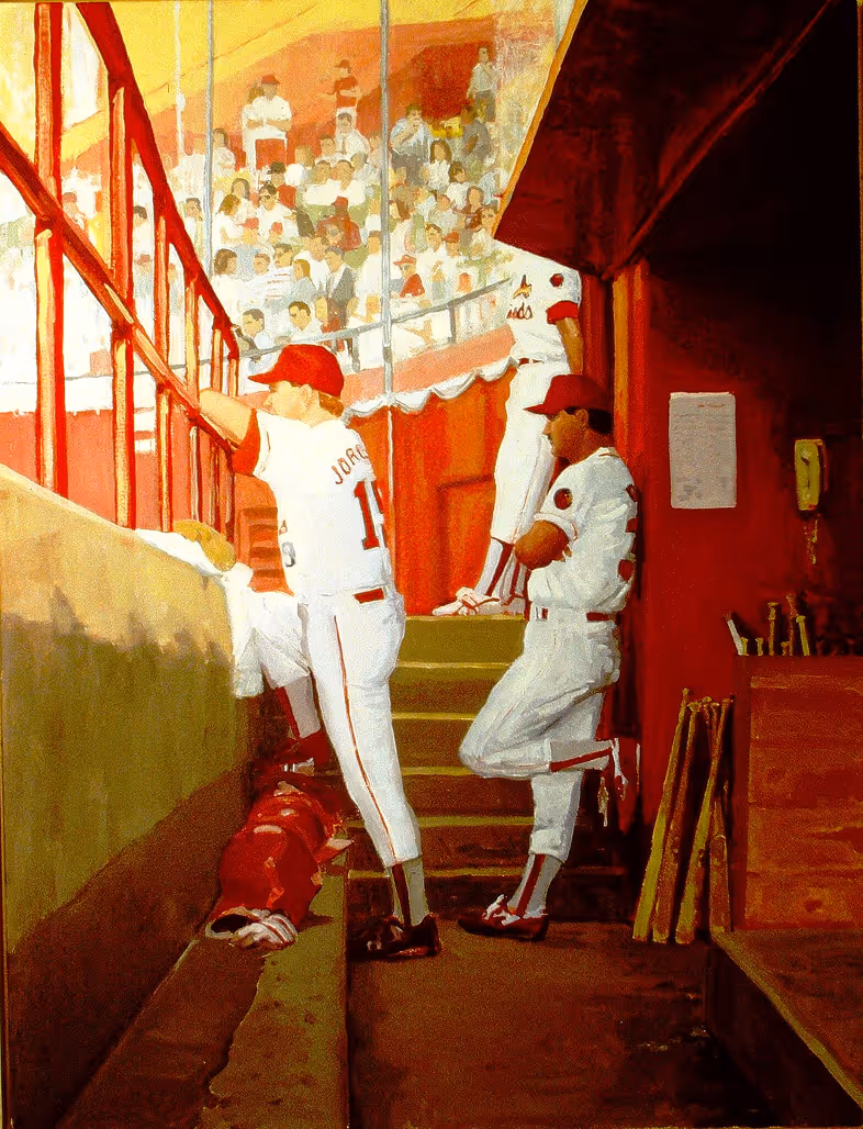 Three baseball players in white uniforms stand in a dugout near bats and crowd seats.