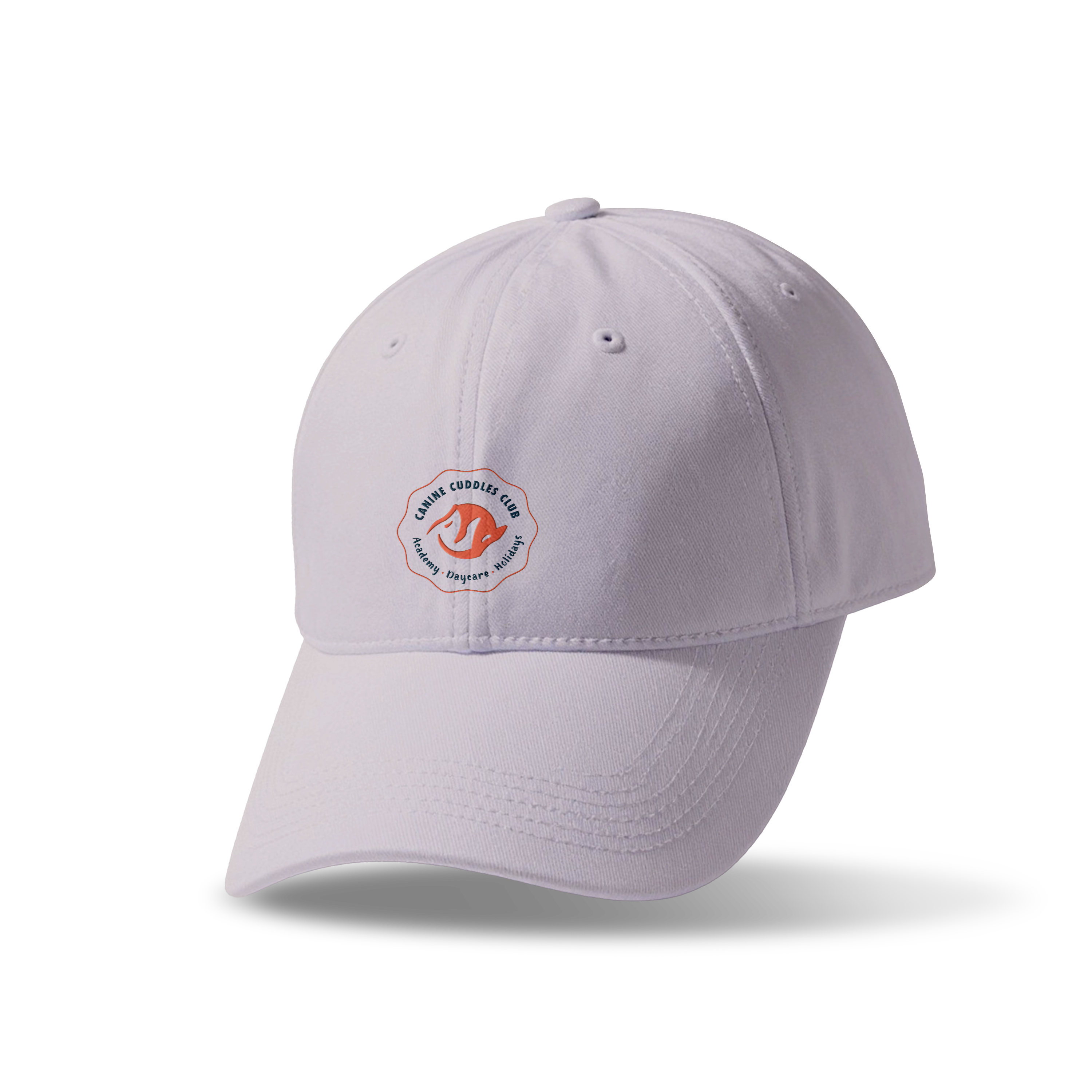 White baseball cap with a Canine Cuddles Club logo featuring an orange dog silhouette.