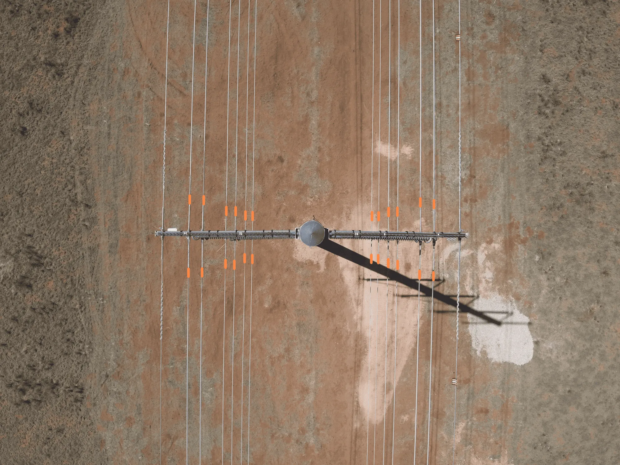 Using a drone to take aerial shots of power lines.