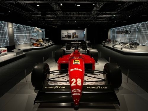 A historic Formula One car professionally lit on display at the F1 Exhibition, Madrid