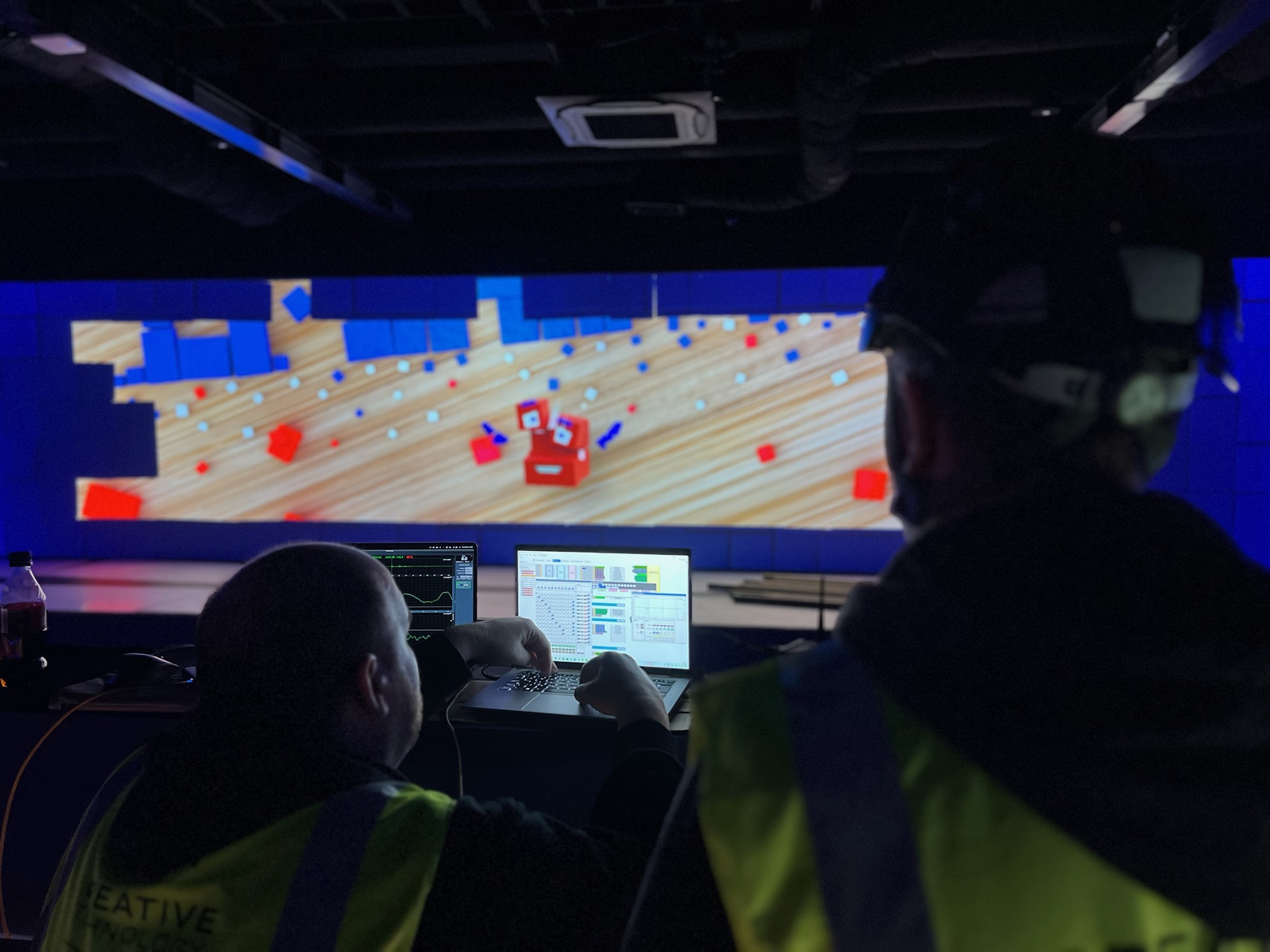 Internal view of a custom-built technical enclosure, showing structured power distribution and show control modules for large-scale event management.