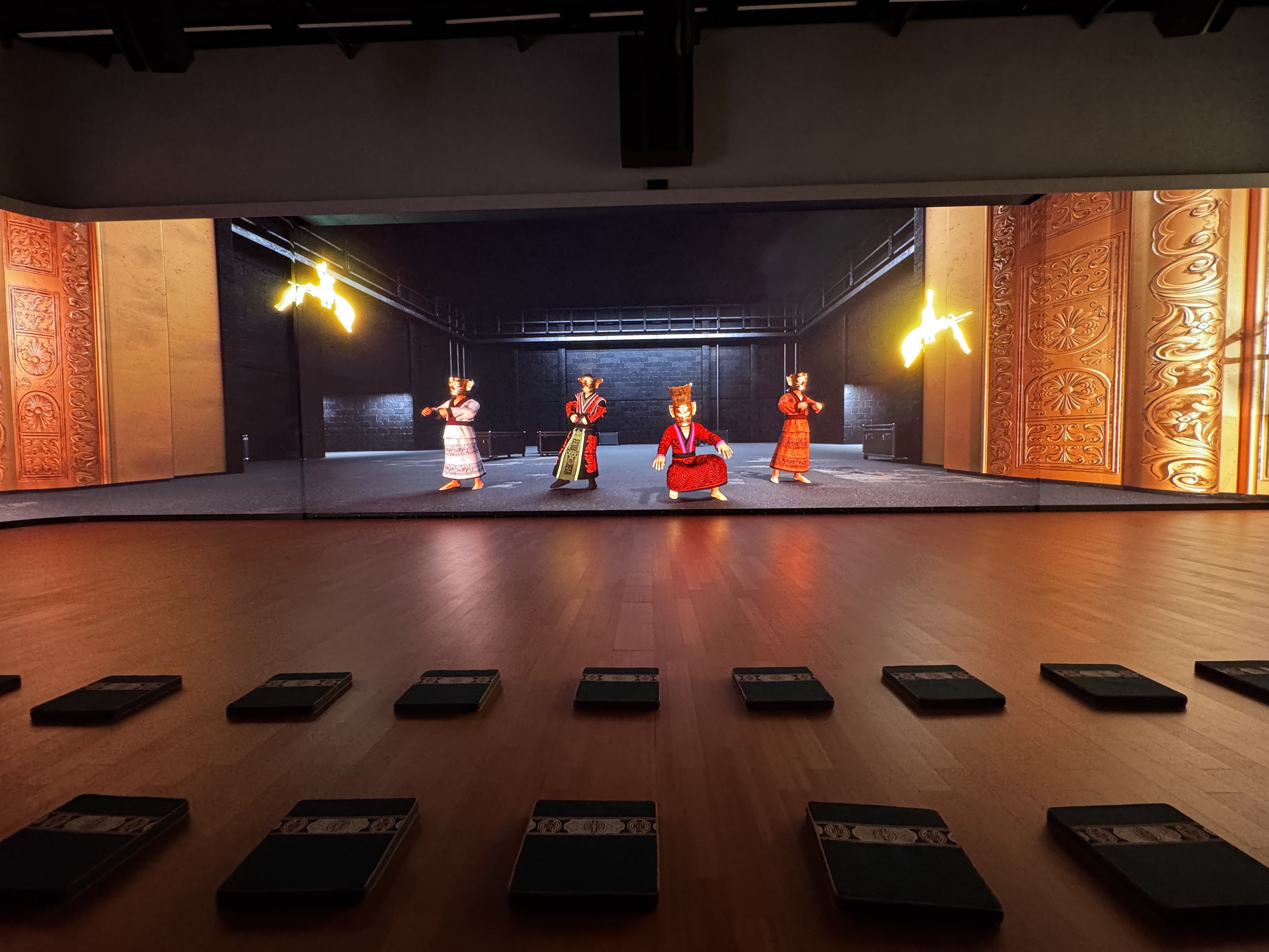 The view of the cinema-grade screen with characters stood in a line