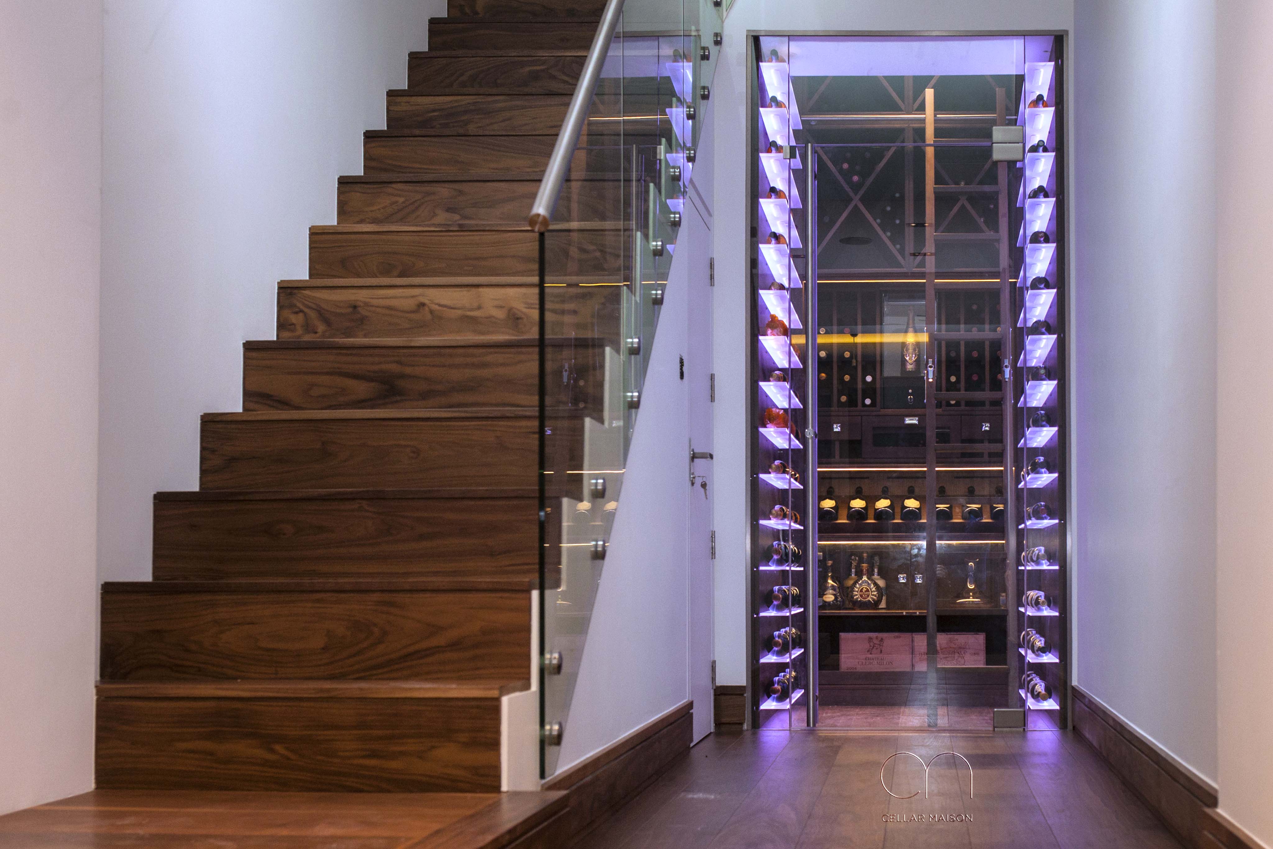 Walnut and acrylic wine room in Hampstead, London by Cellar Maison