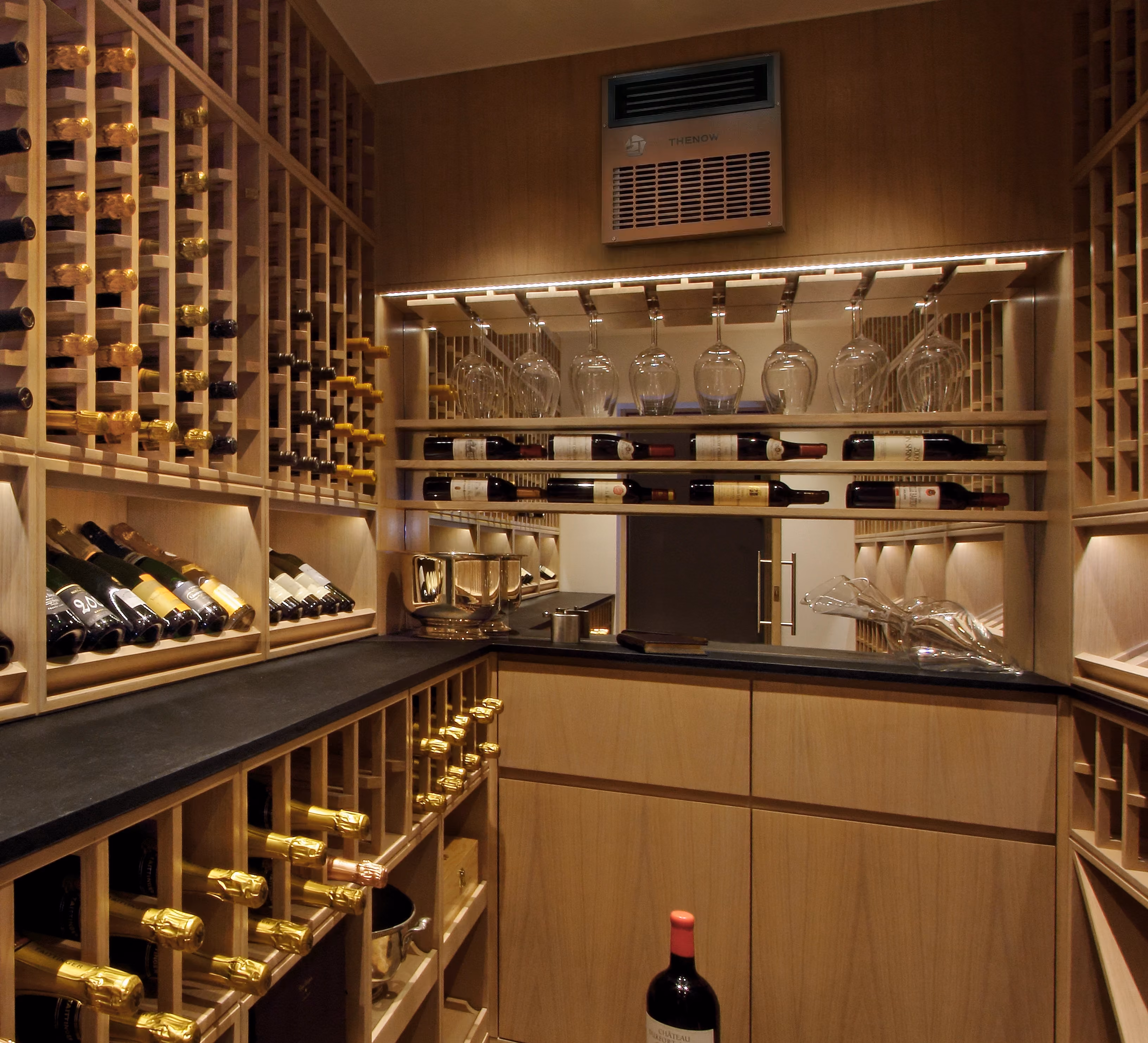JT-20 through-the-wall cooling unit shown installed in a wine room